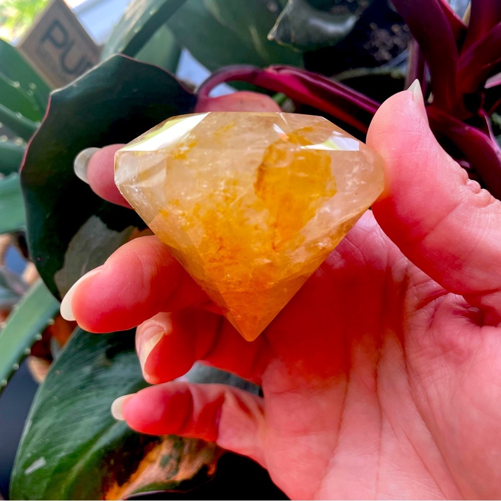 Golden healer quartz gem cut crystal. Diamond shaped.